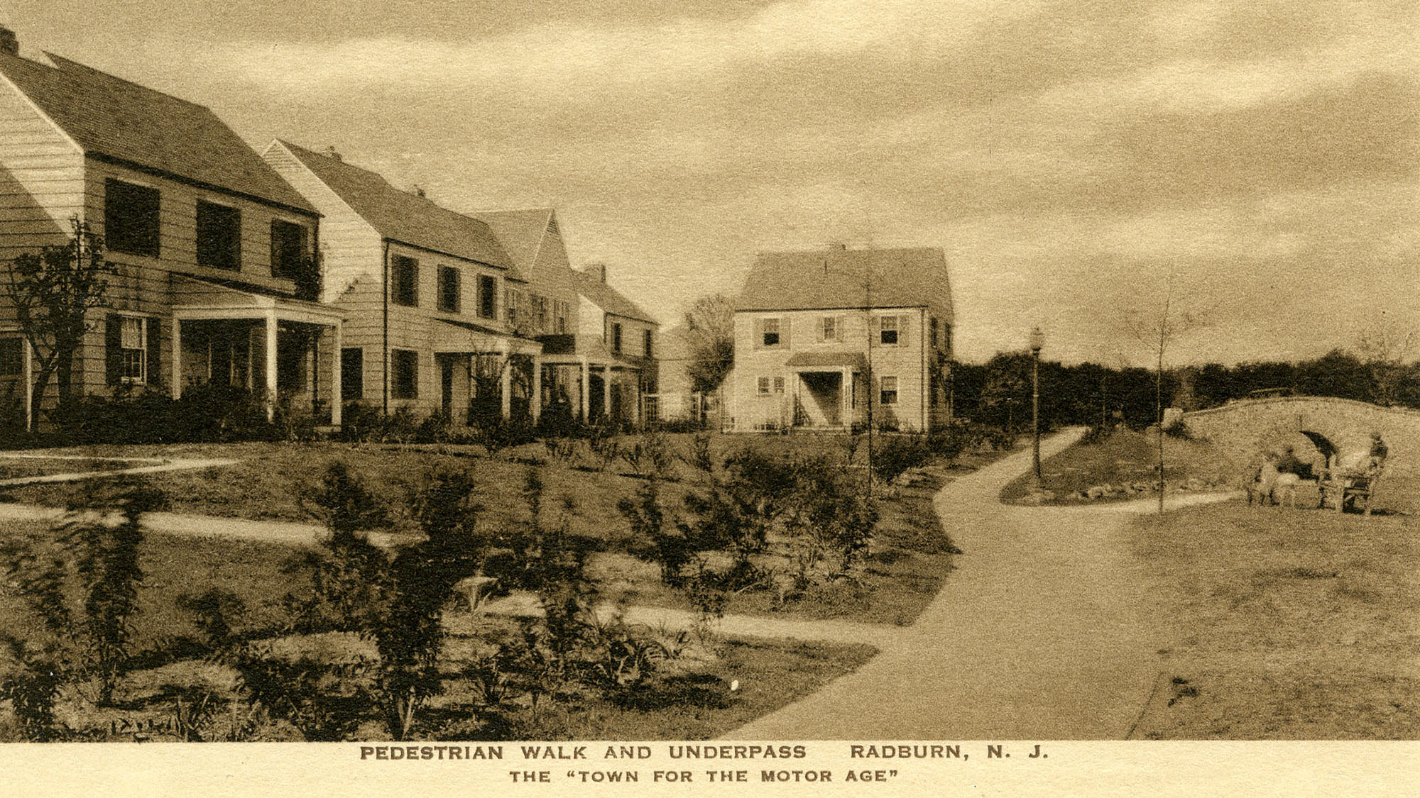 “Pedestrian Walk and Underpass, Radburn, N. J. The Town for the Motor Age.” The town named itself after the thing it was built to wall out.
