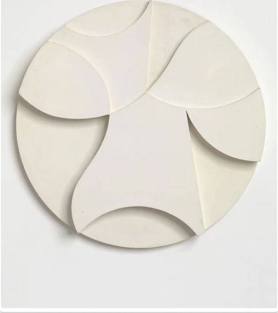 Sophie Taeuber-Arp, white painted-wood relief. Overlapping discs and crescents at low relief.